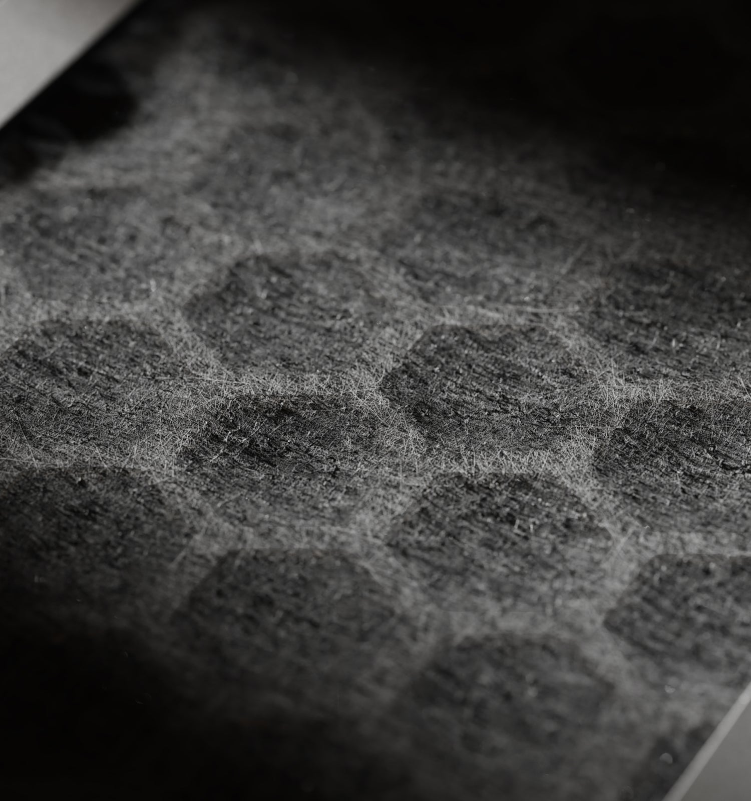 Petlibro PETLIBRO cat pet fountain litter box automatic feeder background, close-up of dark gray textured surface with scratches
