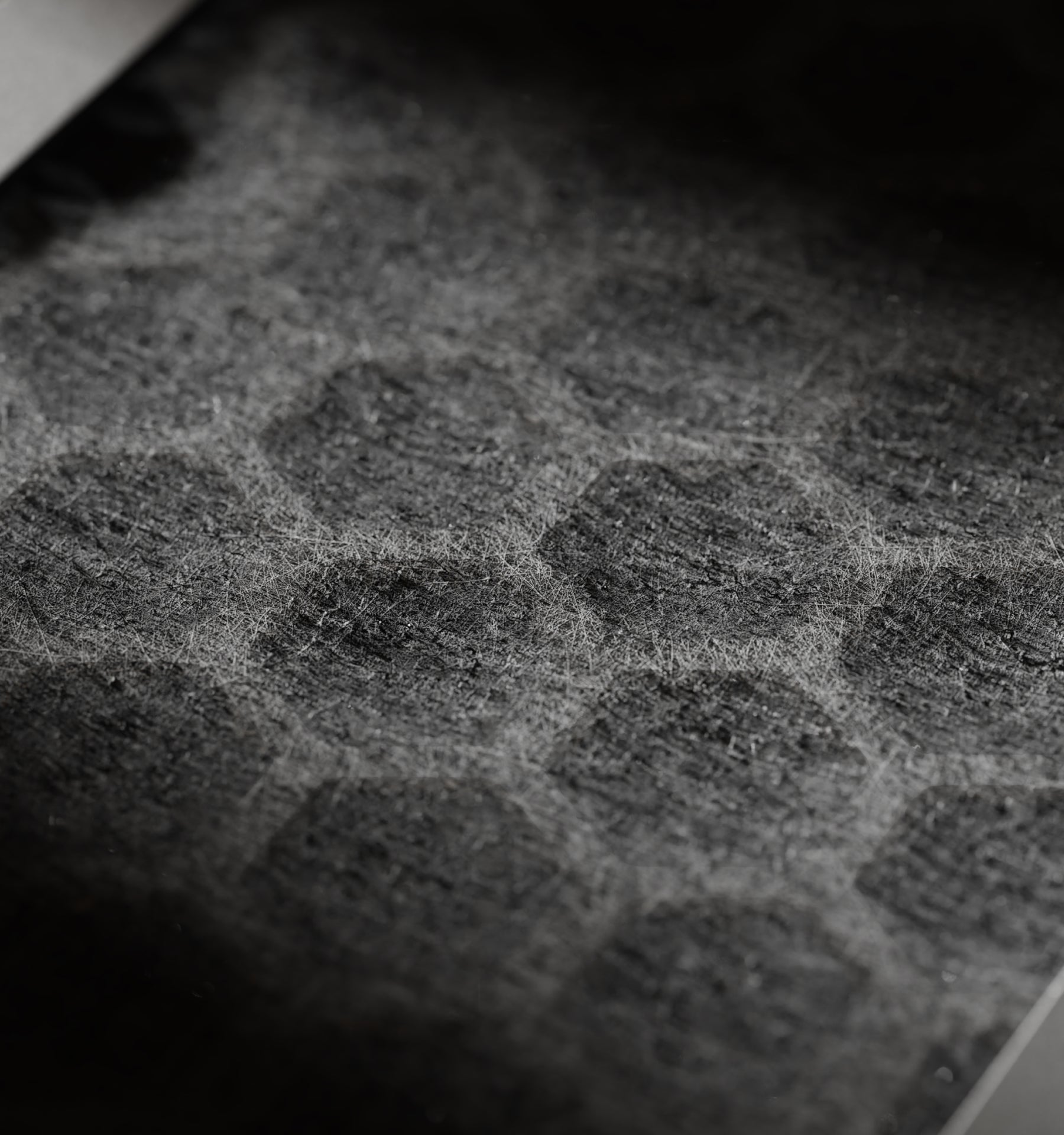 Petlibro PETLIBRO cat pet fountain litter box automatic feeder background, close-up of dark gray textured surface with scratches