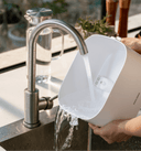 Petlibro PETLIBRO cat pet fountain rinsed in sink; white reservoir, mentions litter box and automatic feeder accessories